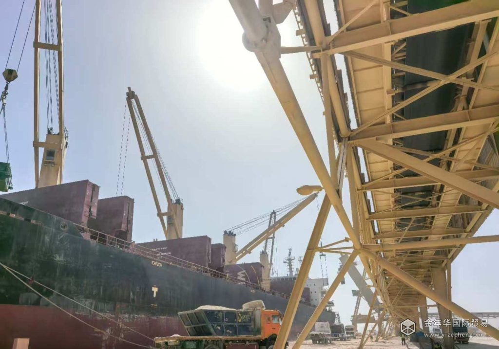 Loading phosphate rock at an Egyptian port terminal
